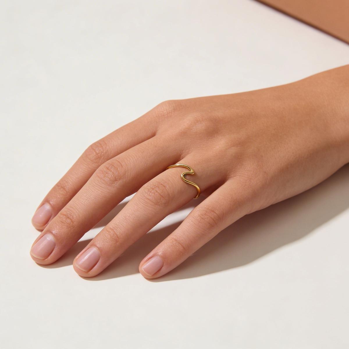 Elegant necklace on marble surface with soft studio lighting